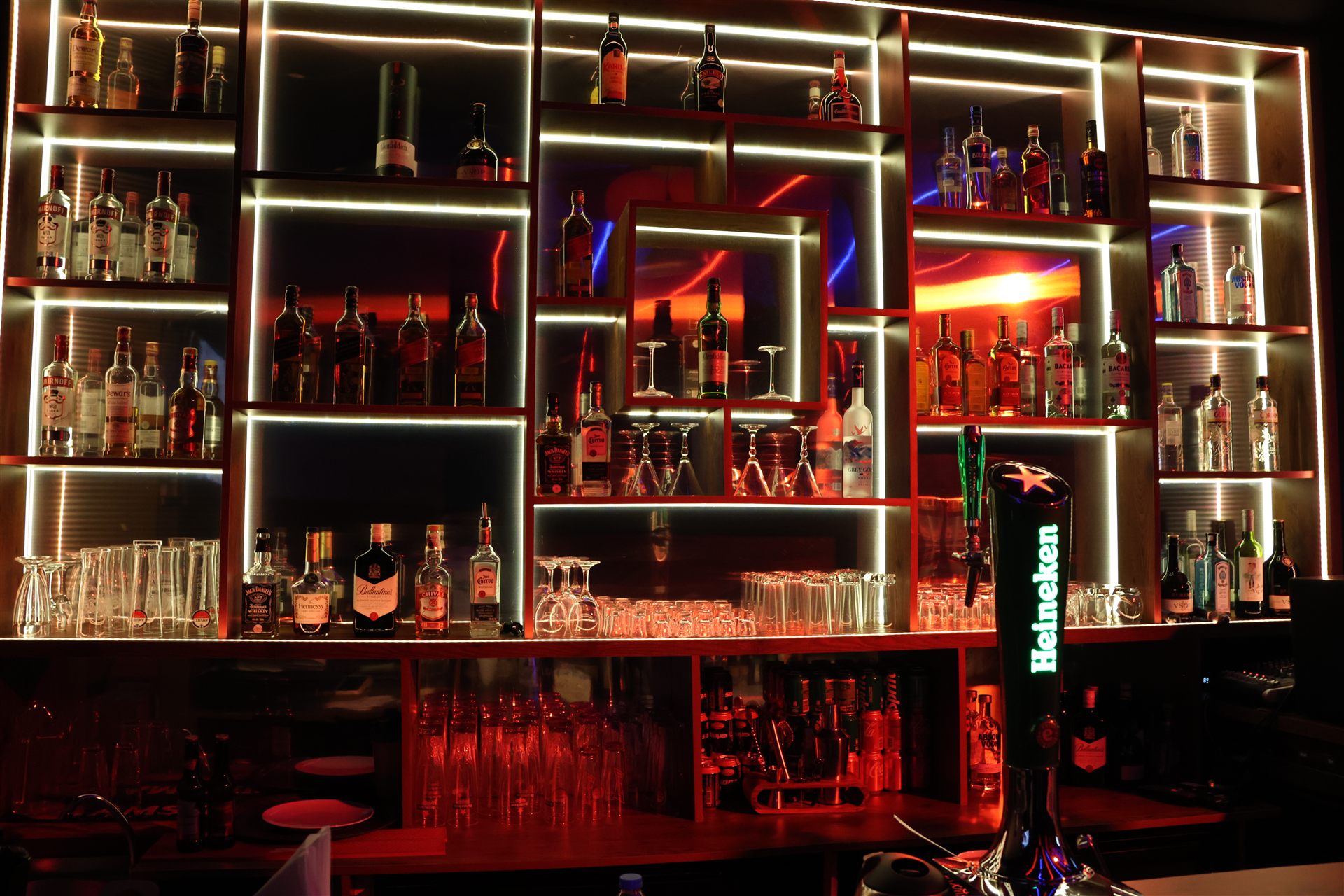 E-TOWN Resto Lounge illuminated bar shelves and drinks display