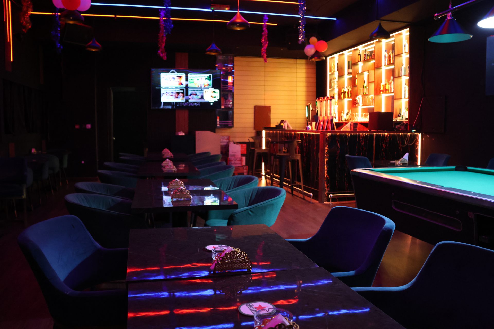 E-TOWN Resto Lounge dining and lounge interior with bar and pool table