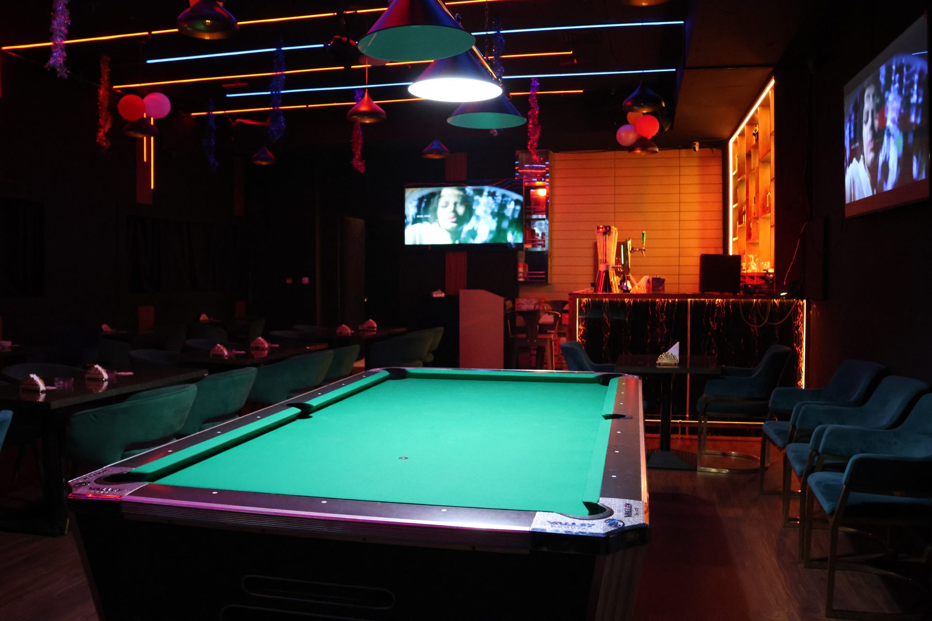 E-TOWN Resto Lounge pool table and lounge seating